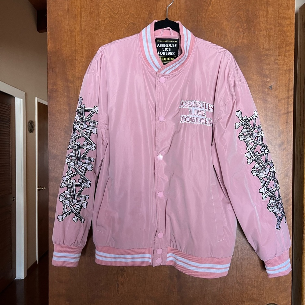 Assholes Live Forever Pink Graphic Bomber Jacket with Bone Sleeve Details